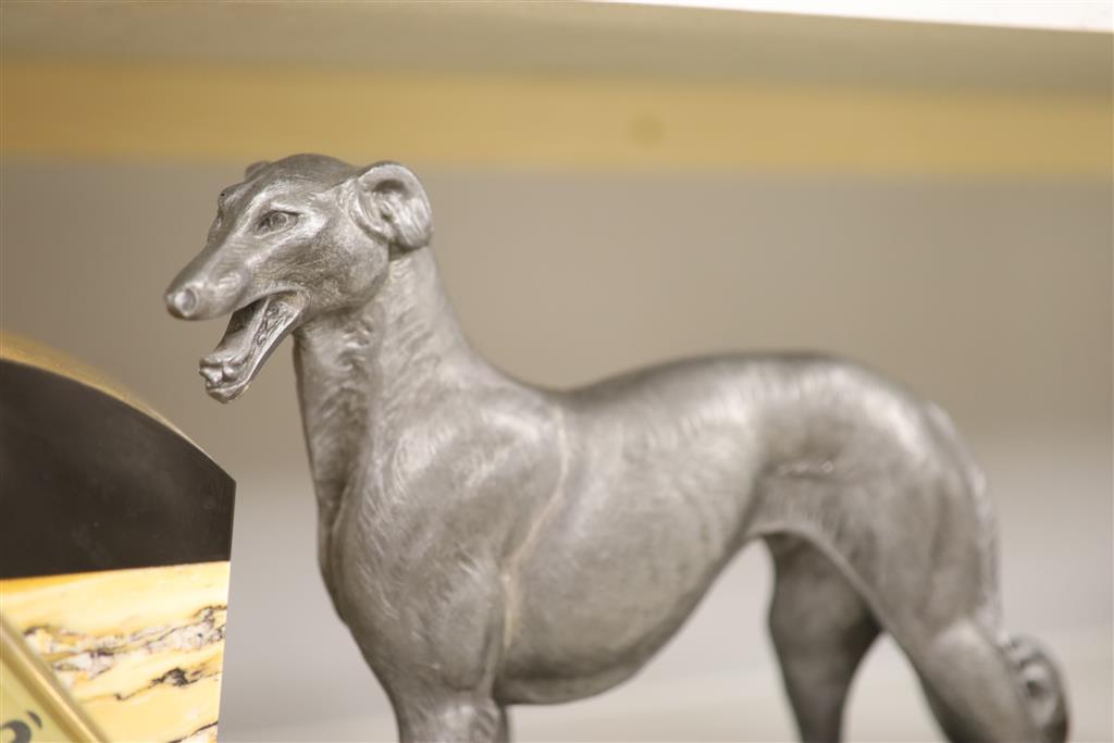 A French Art Deco with borzoi clock garniture, centrepiece length 48.5cm